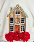 White girls’ top with pearl-style gingerbread house embellishments