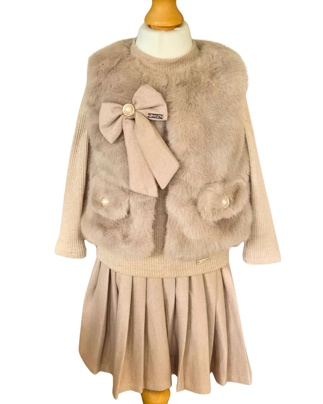 Girls mink beige pleated skirt and faux fur gilet outfit
