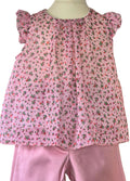 Girls holiday outfit with pink shorts and floral blouse