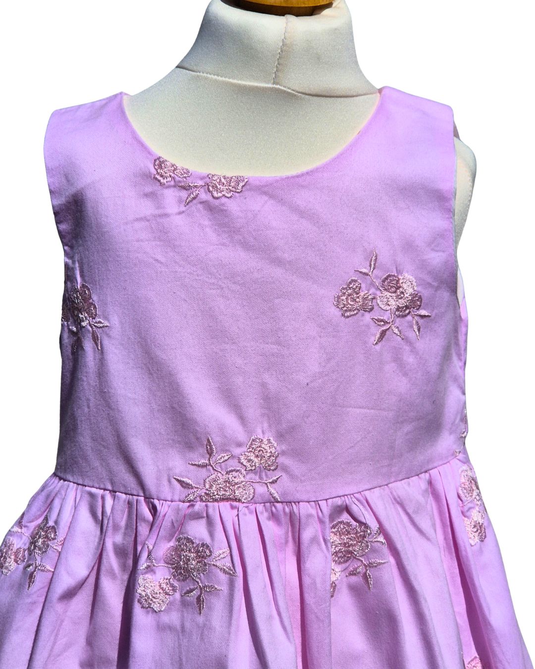 Girls sleeveless party dress with embroidered flowers