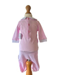 Traditional pink baby romper with Peter Pan collar