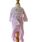 Pink and white cotton baby romper with duck bib