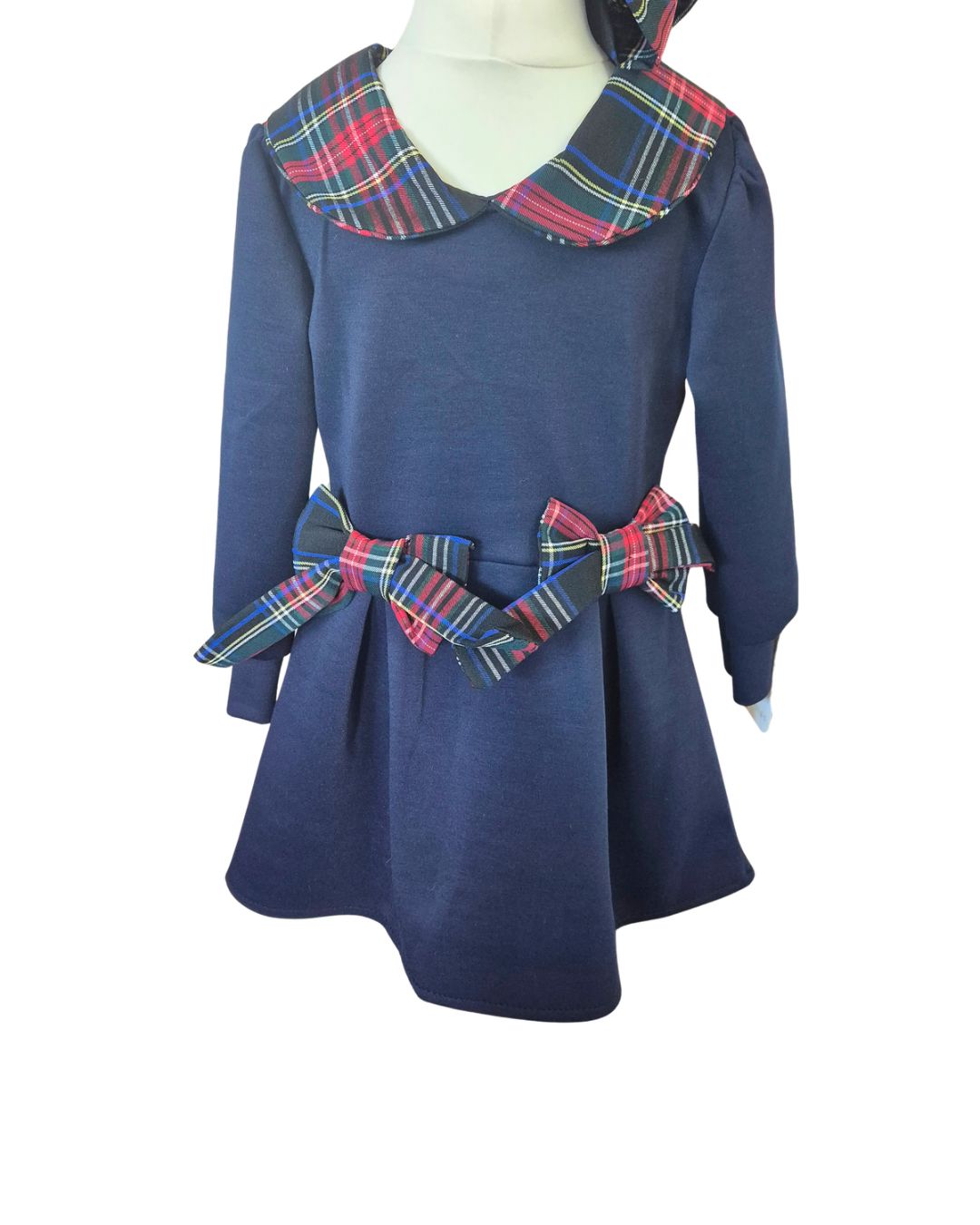 Girls navy dress with tartan collar and kick pleats