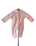 Pink and white footed baby sleepsuit with satin bows