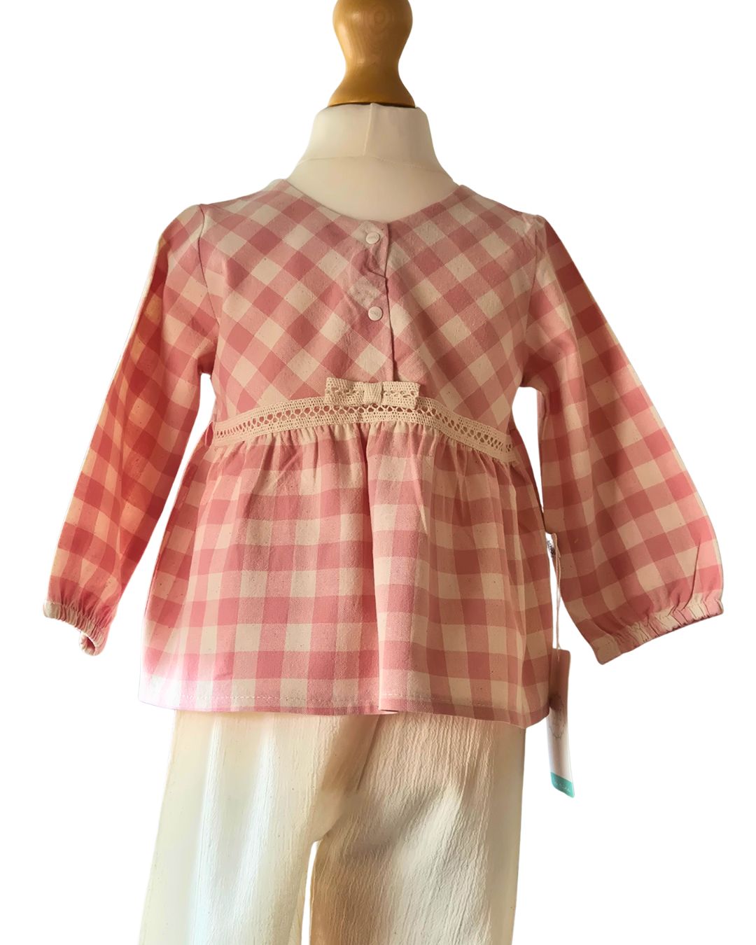 Baby girls pink checked top and cream trousers