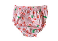 Pink children's bloomers with cherry pattern on a white background