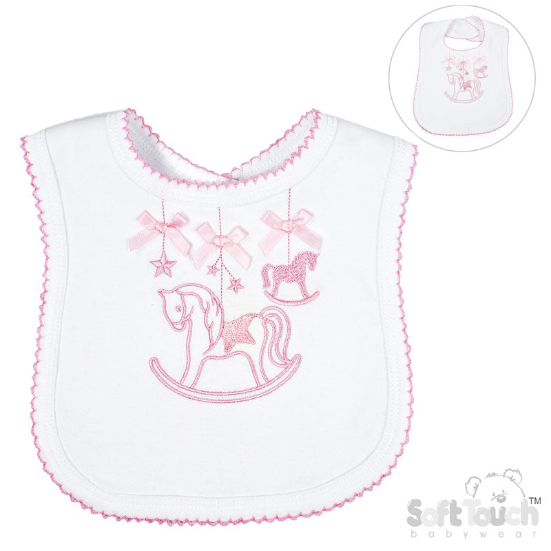 White baby bib with pink scalloped edging