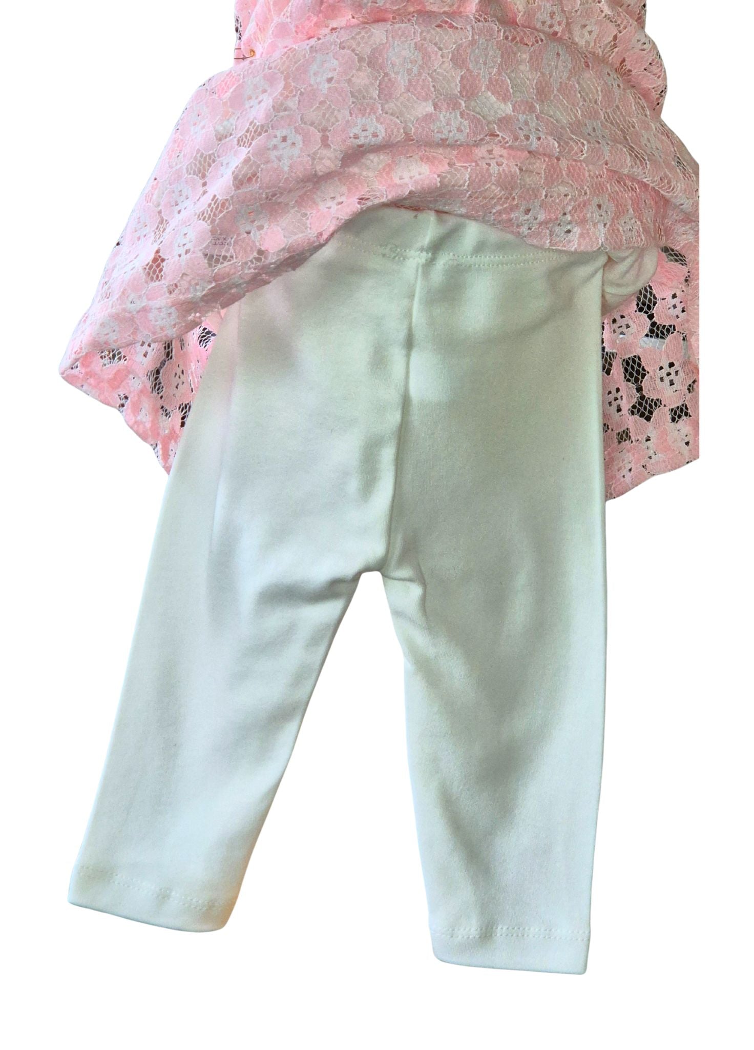 White leggings with a pink floral top on a white background