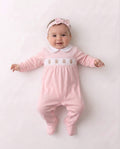 Pink velour smocked teddy bear sleepsuit
