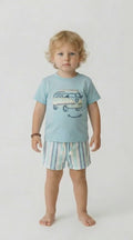 Toddler in an aqua t shirt with an applique campervan and co ordinating striped aqua, cream and grey shorts