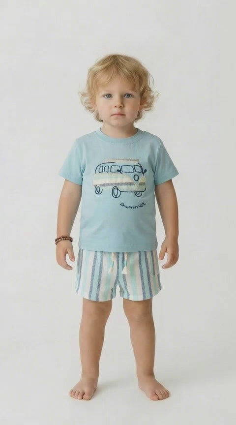 Toddler in an aqua t shirt with an applique campervan and co ordinating striped aqua, cream and grey shorts