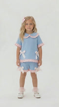 girls baby blue frill shorts and top set with pink bows