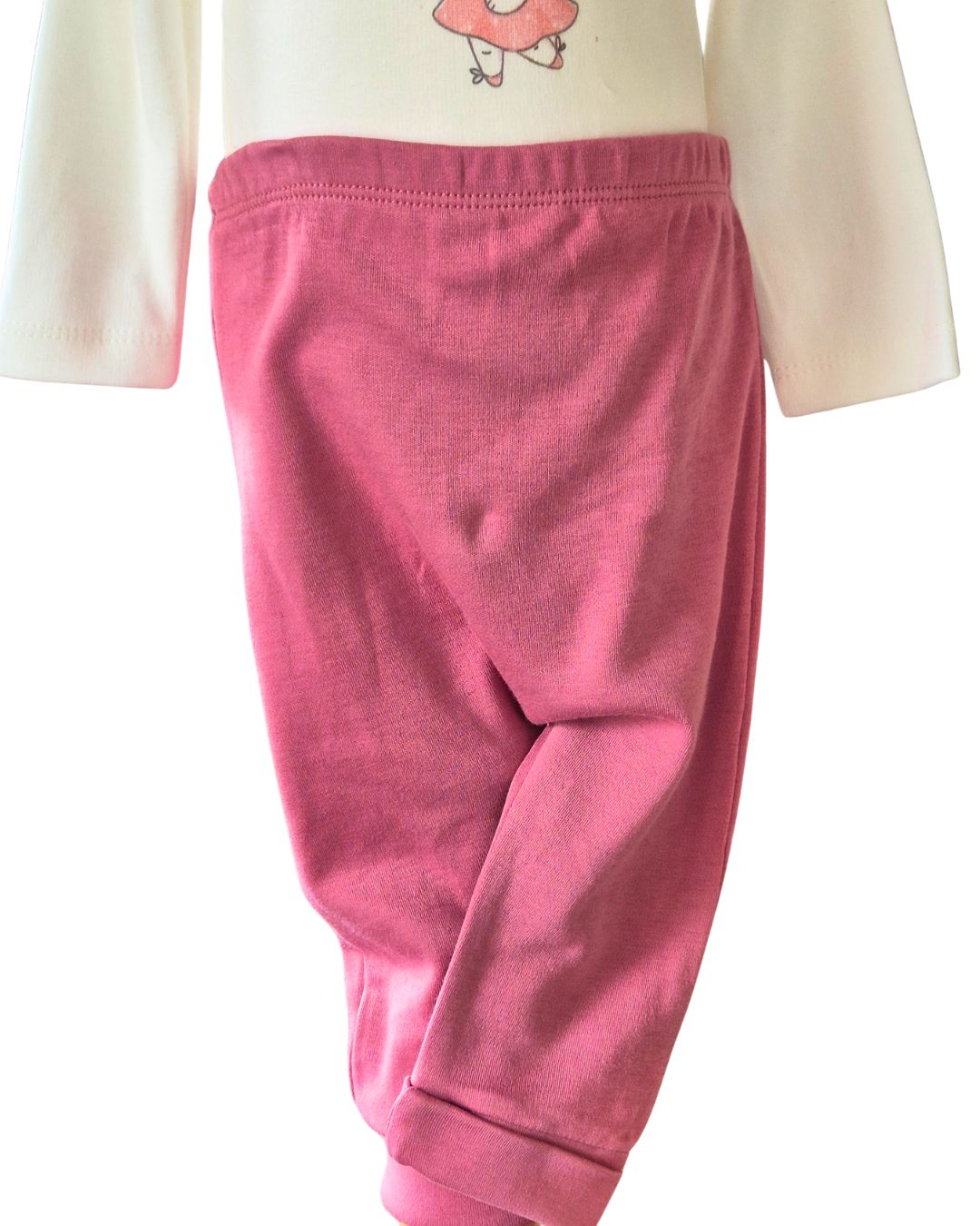 Girls dusty rose trousers with elasticated waist and faux turn ups