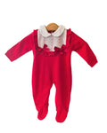 Red and white footed baby sleepsuit with satin bows