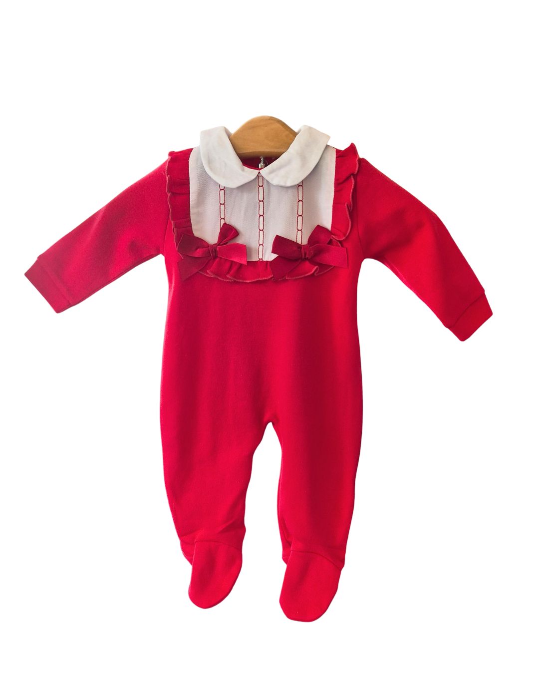Red and white footed baby sleepsuit with satin bows