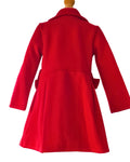 Girls red coat with full skirt and kick pleats