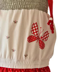 Red polka dot playsuit with tie straps and bead detail