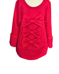 Vivid red girls' party dress with sparkle bows and fluffy hem