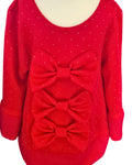 Red girls' occasion dress with statement bow detailing