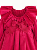 Girls’ classic red velvet dress with bow neckline