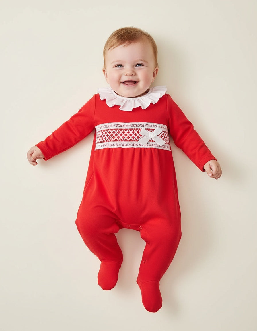 Red baby sleepsuit with lace panel