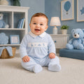 Boys sky blue velour dinosaur sleepsuit with Peter Pan collar