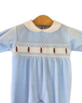 Sky blue baby grow with white smocked soldier panel