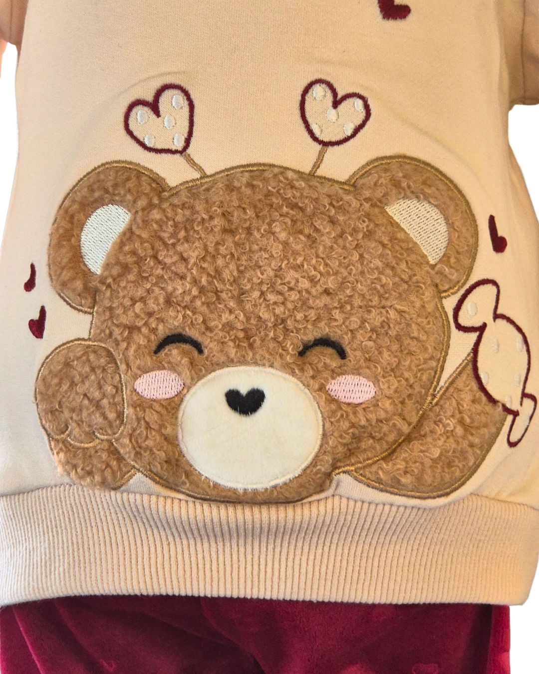 Girls cream teddy appliqué top with burgundy trousers