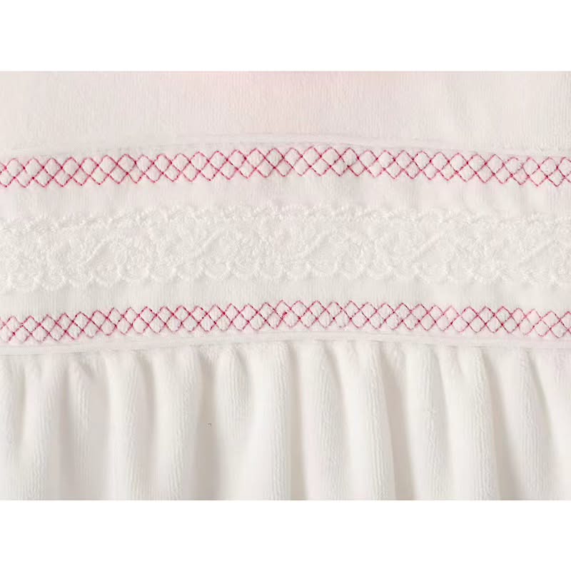 Baby white and pink smocked sleepsuit with lace trim
