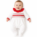 White and red baby velour sleepsuit with frill neckline