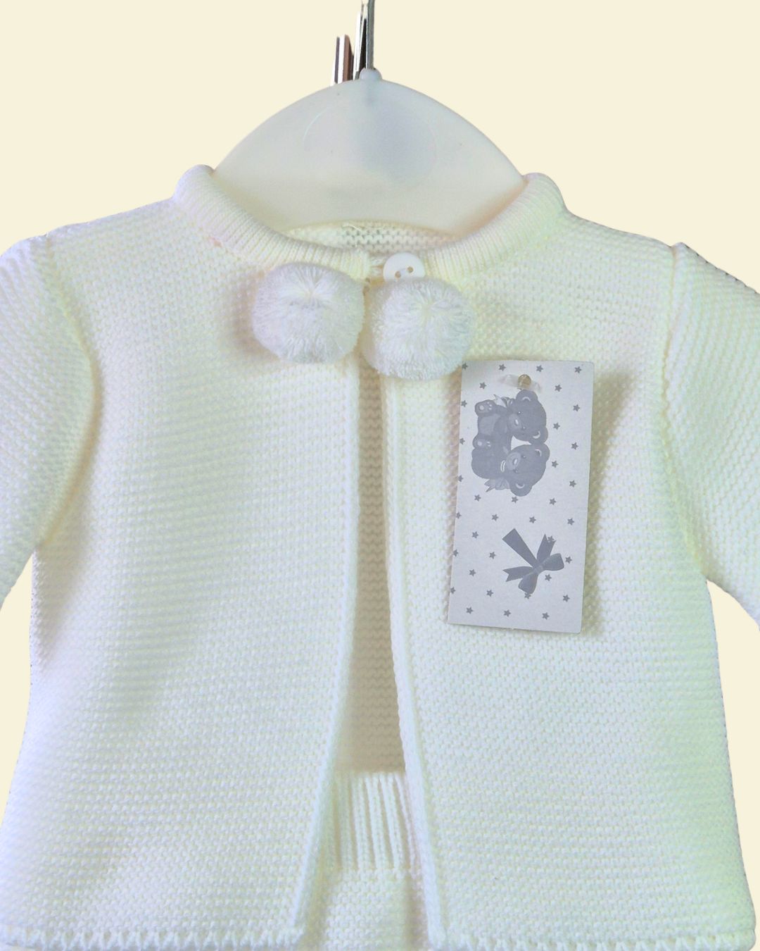 Portuguese white knitted baby outfit with pom pom details