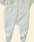 Newborn white knitted trousers with pom pom feet