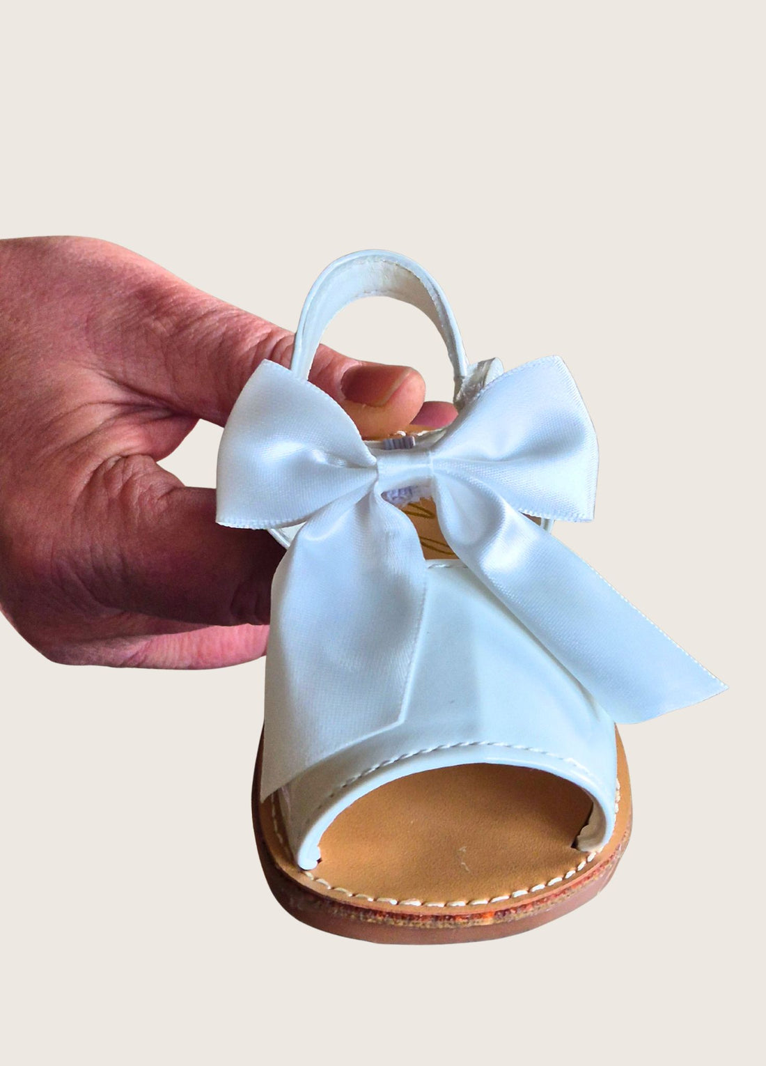 Sevva Ltd Martina white children's sandal with detachable satin bow and Velcro strap, EU 20–25.