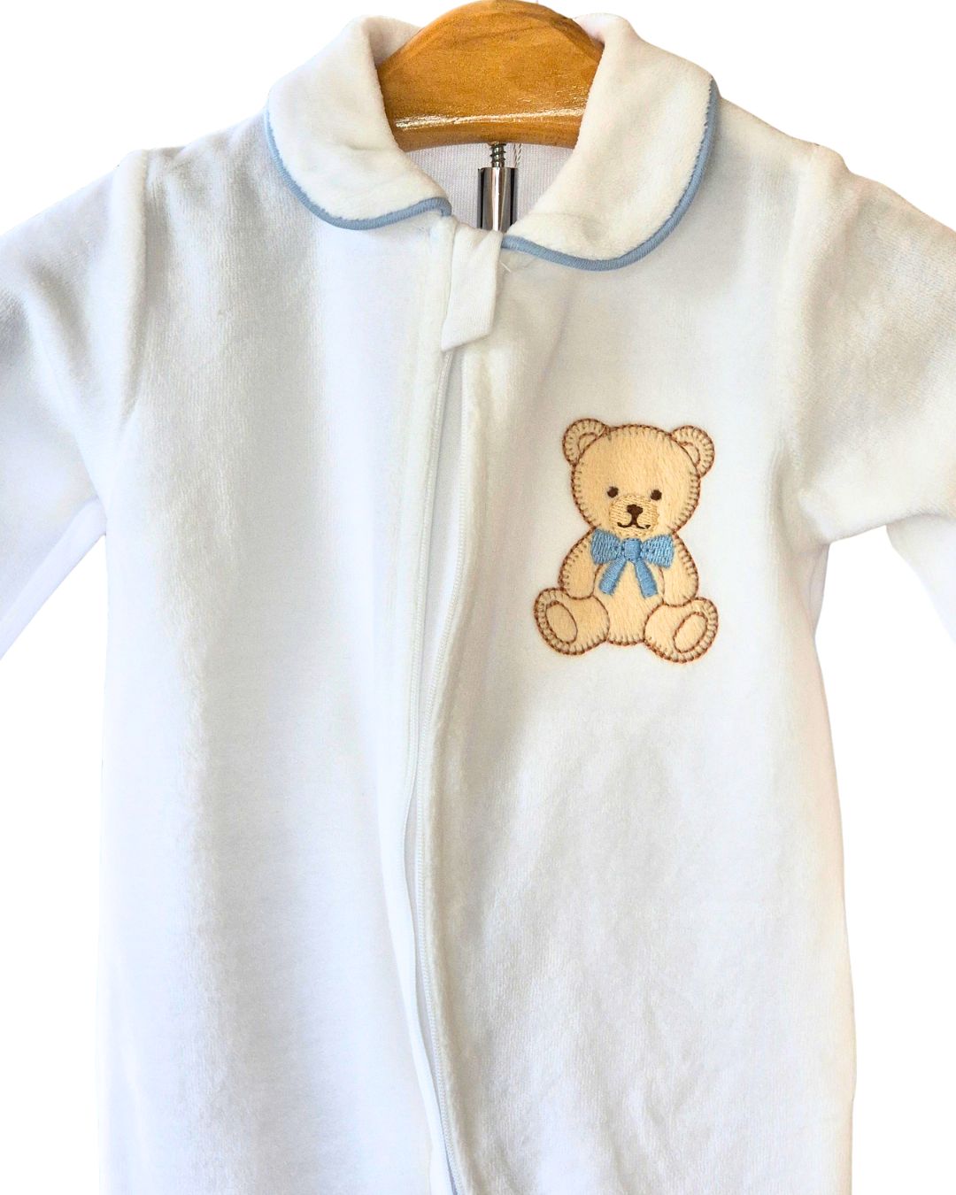 White zip front baby sleepsuit with blue trim